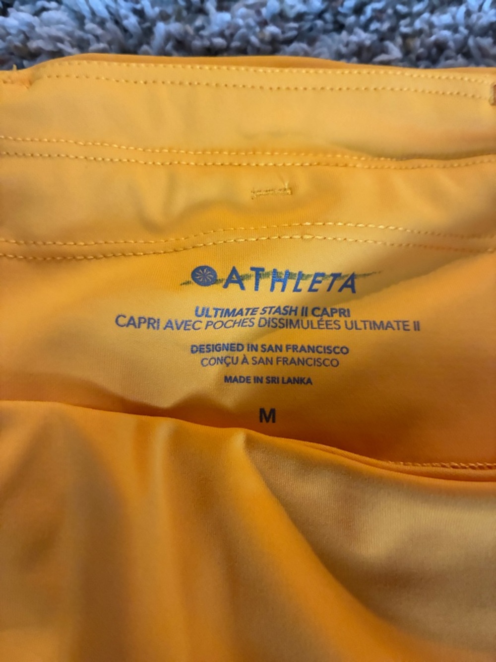 Athleta Bright Yellow Ultimate Stash II Capri - Women's M